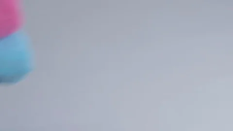 Close-up of hands putting stack of fresh bath towels on the bed sheet. Room Stock Footage 124327189