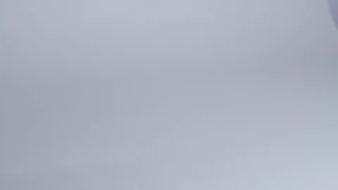 Close-up of hands putting stack of fresh bath towels on the bed sheet. Room Stock Footage 124327266