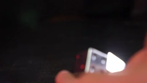 Close-up of hands rolling dice Stock Footage 144036729