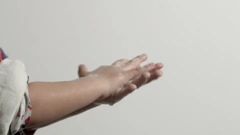 Close-up of Hands Rubbing Flour Together on Gray Background Vidéo 334647575
