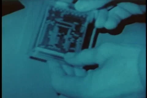 Close-up of hands scanning memory card Stock-Footage 11354683