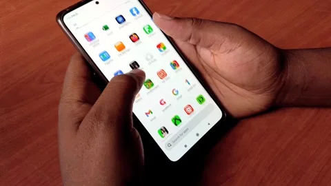 Close up of Hands Scrolling Smartphone Apps Stock Footage 255951019