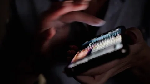 Close-Up: Hands Scrolling on Smartphone Screen Stock Footage 293150896