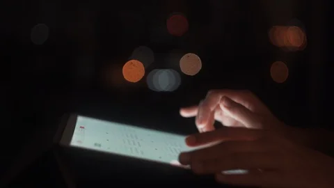 Close up Of Hands Scrolling On The Tablet Late Dark Night. 4K Stock Footage 120358279