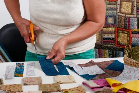 Close-up of the hands of a seamstress Stock Photos