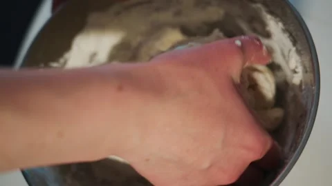 Close-up of hands shaping dough Stock Footage 336083764