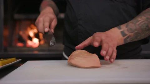 Close up hands сhef cutting foie gras with a knife raw lunch condiment Stock Footage 103288723