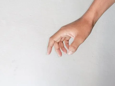 Close up of hands showing gestures on textured background Stock Photos