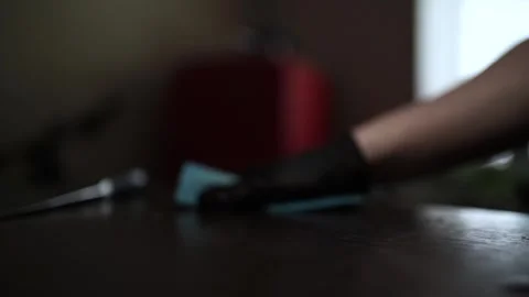 Close-Up of Hands Slicing Fresh Salmon Fillet on a Dark Background Видео 303921832