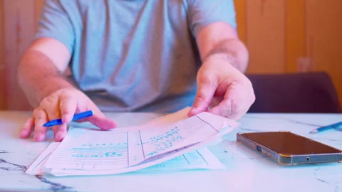 Close-up of hands sorting documents and stacking them neatly Stock Footage 336694468