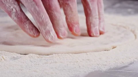 Close-up Of Hands Stretching Dough Stock Footage 231304000