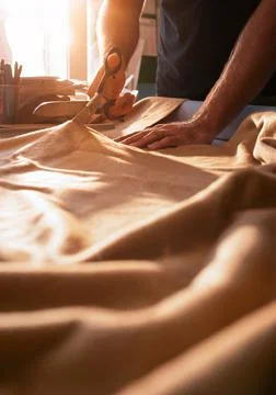 Close up of hands of a tailor Stock Photos