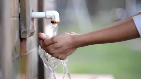 Close up of a hands taking water. Stock Footage