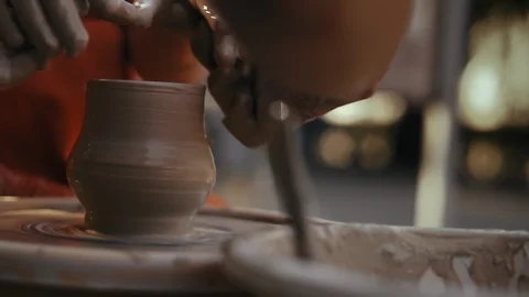 Close-up, Hands of the Teacher on Pottery Teach The Apprentice's Work with Clay Stock Footage 123073170