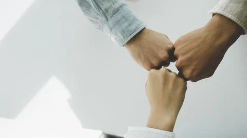 Close up hands Teamwork group of multi racial people meeting join hands. Stock Photos