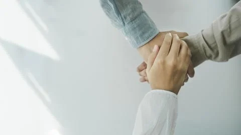 Close up hands Teamwork group of multi racial people meeting join hands. Stock Photos