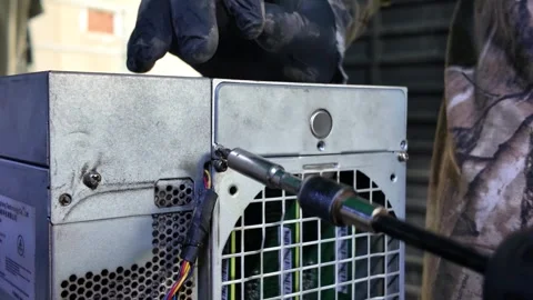 Close-up of hands of technician assembly an Antminer S17 hashboard minner Stock Footage 327340492