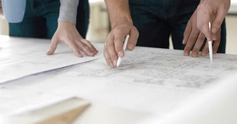 Close-up of the hands of three designers Stock Footage 82273569