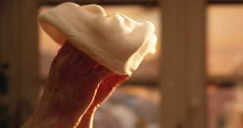 Close up of hands tossing dough, turning it in mid air. Slow motion 스톡 동영상 267211675