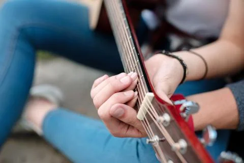 Close up of hands touching the strings Stockfoto's
