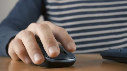 Close up of hands typing on computer keyboard and mouse Video stock 83509408
