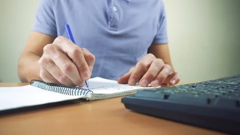 Close up of hands typing on computer keyboard and mouse Video stock 83509756