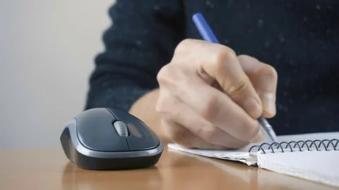 Close up of hands typing on computer keyboard and mouse Stock Footage 84280296