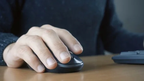 Close up of hands typing on computer keyboard and mouse Stock Footage 84280679