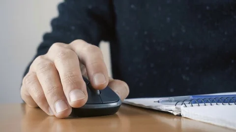 Close up of hands typing on computer keyboard and mouse Stock Footage 84498269