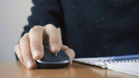 Close up of hands typing on computer keyboard and mouse Stock Footage 84498492