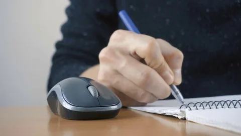 Close up of hands typing on computer keyboard and mouse Stock Footage 84498702