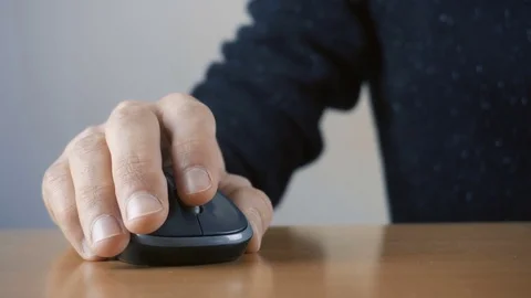 Close up of hands typing on computer keyboard and mouse Stock Footage 84498917