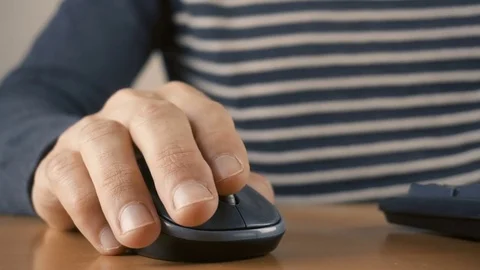 Close up of hands typing on computer keyboard and mouse Stock Footage 84500316