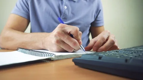 Close up of hands typing on computer keyboard and mouse Stock Footage 84500818