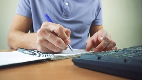 Close up of hands typing on computer keyboard and mouse Stock Footage 84501173