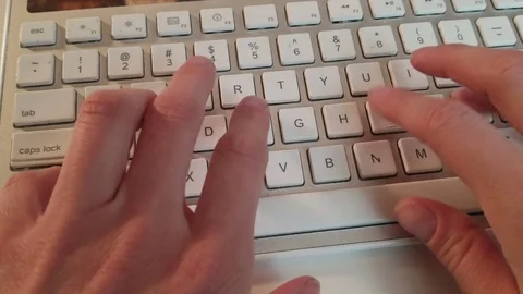 Close-Up of Hands Typing on Computer Keyboard Stock Footage 84998751
