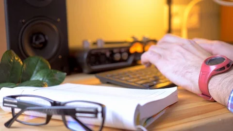 Close up of hands typing on a computer keyboard Stock Footage 129986217