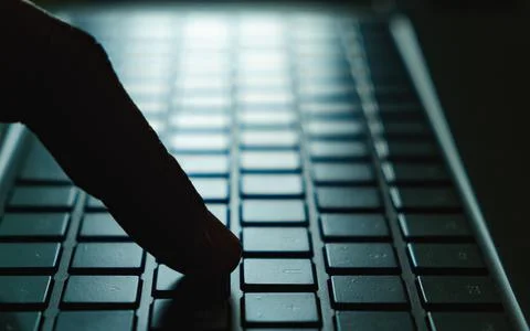 Close-up of hands typing on a computer keyboard. Keyboard closeup view Stock Photos