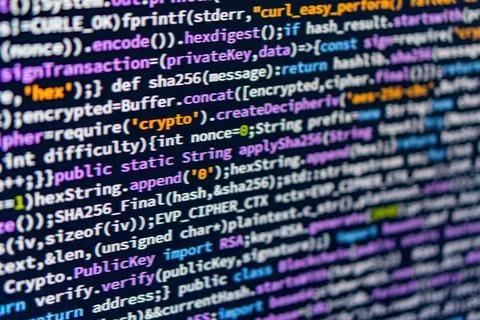 Close-up of hands typing on a computer keyboard, with overlaid cybersecurit.. Foto stock