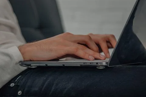 Close-up of hands typing on computer Foto stock