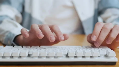 Close-up Hands Typing Keyboard on Computer Working in Home Office Stock Footage 169495475