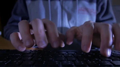 Close-up of hands typing on the keyboard in the dark Video stock 72541054