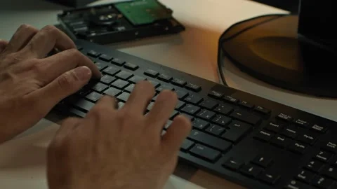 Close up of hands typing on a keyboard Stock Footage 168906499