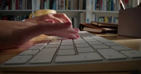 Close up hands typing on keyboard in home office student studying browsing Stock Footage 138395908