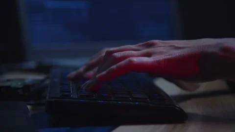 Close-up of Hands Typing on Keyboard in Low Light Environment Stock Footage 281759545