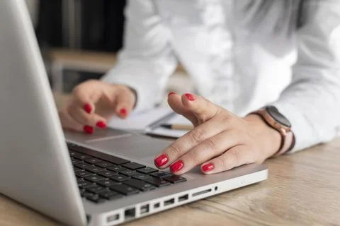 Close up hands typing on keyboard Stock Photos