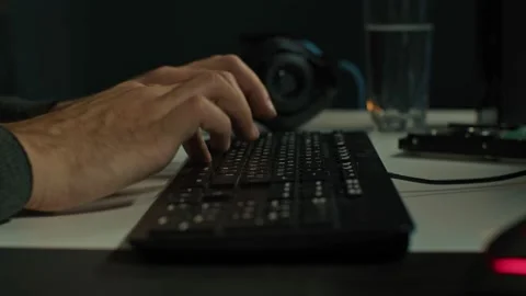 Close up hands typing on keyboard programmer coding software gamer using Video stock 168946526