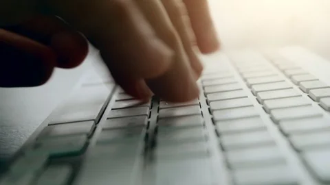 Close up hands Of Typing On Keyboard Of A White Computer Laptop., indoors 動画素材 114229850