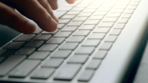 Close up hands Of Typing On Keyboard Of A White Computer Laptop., indoors Stock Footage 114229856