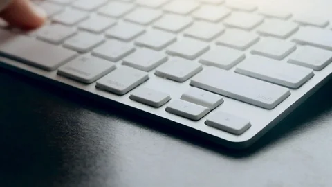 Close up hands Of Typing On Keyboard Of A White Computer Laptop., indoors Video stock 114229857